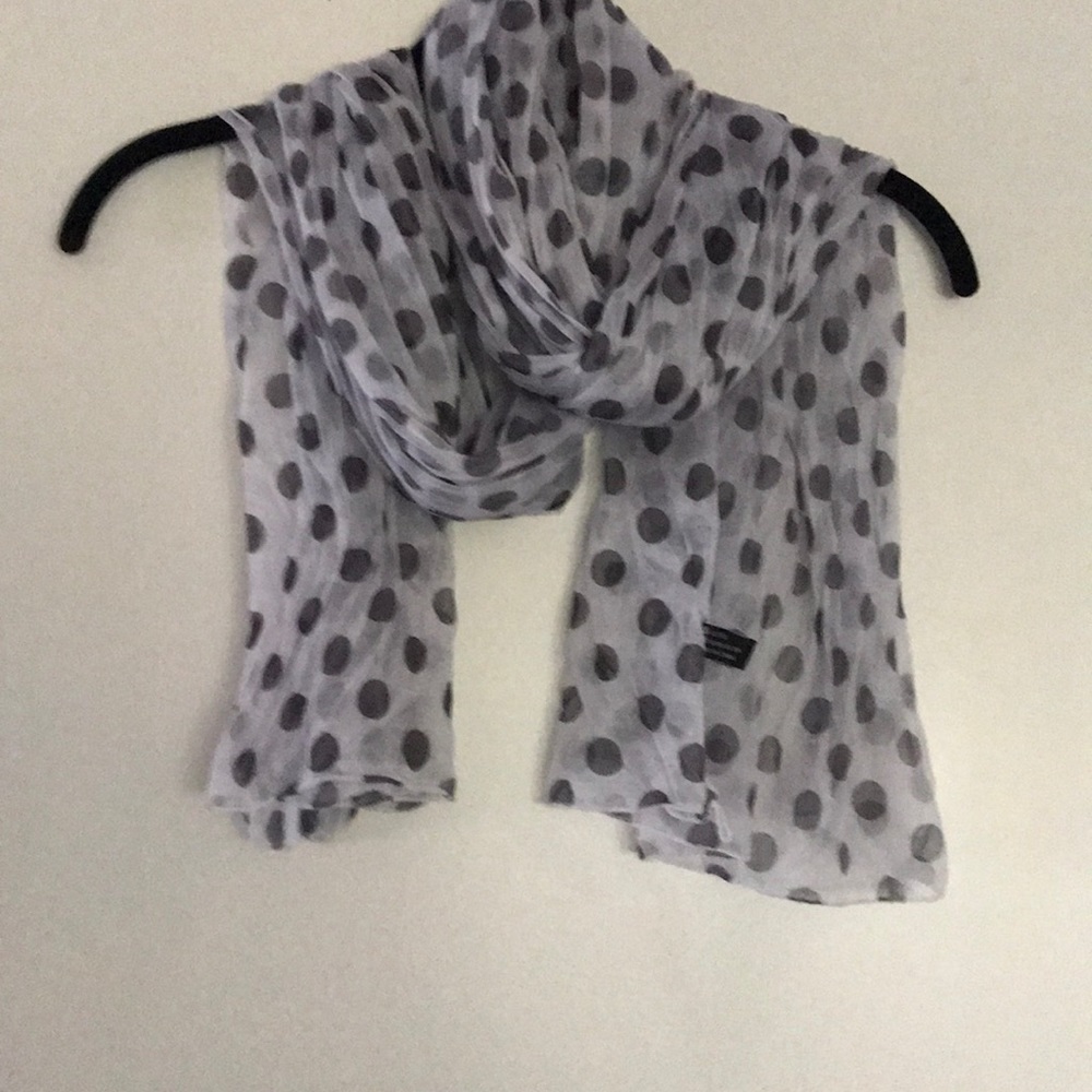 Adorable polka dot scarf.